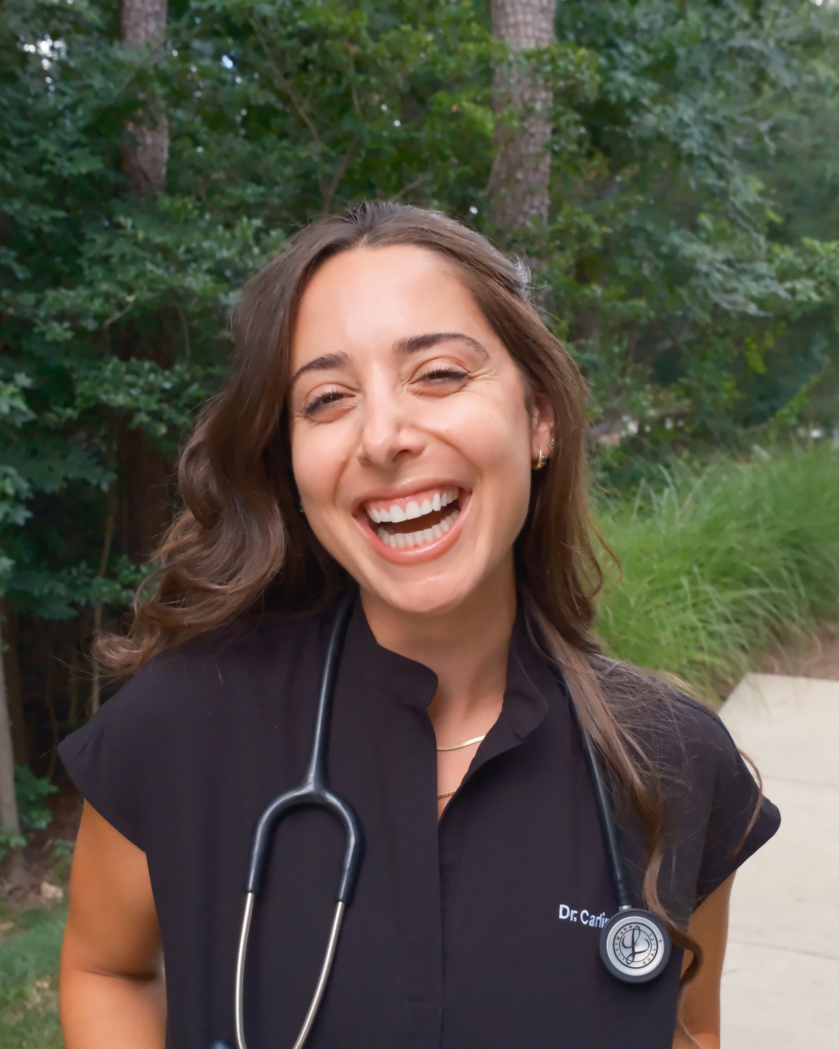 Dr. Julia Carlin in scrubs